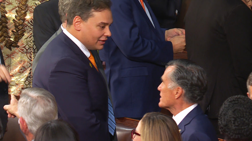 Rep. George Santos, R-N.Y., speaks with Sen. Mitt Romney, R-Utah, spoke before the State of the Union Tuesday. Santos would later disregard Romney's remarks, and chose to make himself a spectacle during the speech. Credit: NBC